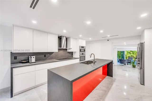 a living room with furniture a flat screen tv and a large window