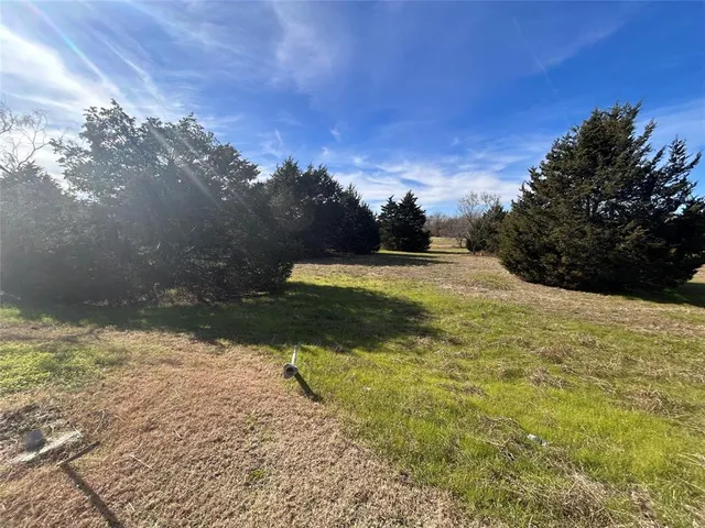 a view of an ocean and a mountain
