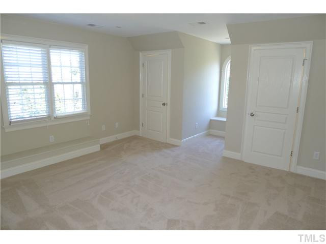 114 Lantern Ridge Lane Cary, NC 27519 - Photo 17 of 25 Located on the third floor is this media room, though it can be used as a bedroom, game room, office or whatever your imagination can think up. Features include dual closets with motion activated lighting, surround sound pre-wire and a wet bar. Media Room