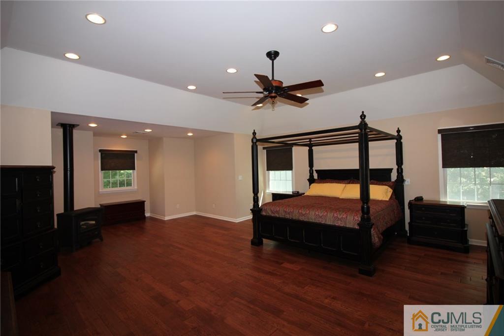 252 Deans Rhode Hall Road Monroe Township, NJ 08831 - Photo 18 of 25 a living room with furniture and a flat screen tv