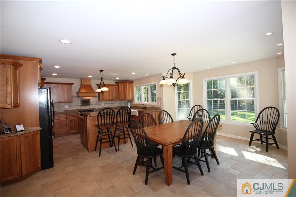252 Deans Rhode Hall Road Monroe Township, NJ 08831 - Photo 7 of 25 a view of a dining room with furniture window and outside view