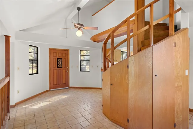 a kitchen with stainless steel appliances a stove a sink and a refrigerator