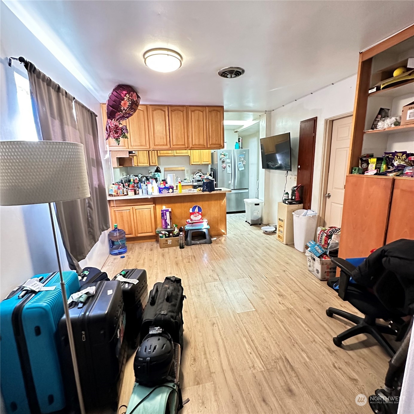 535 Smithers Avenue South Renton, WA 98057 - Photo 15 of 15 a bed room with furniture and a flat screen tv