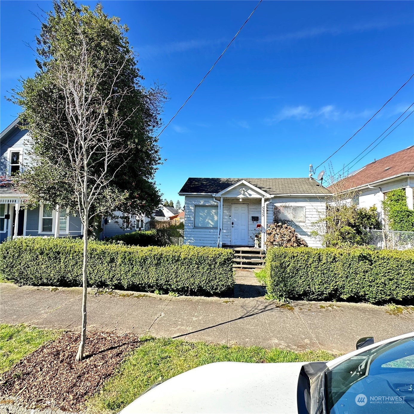 535 Smithers Avenue South Renton, WA 98057 - Photo 5 of 15 a front view of a house with a yard