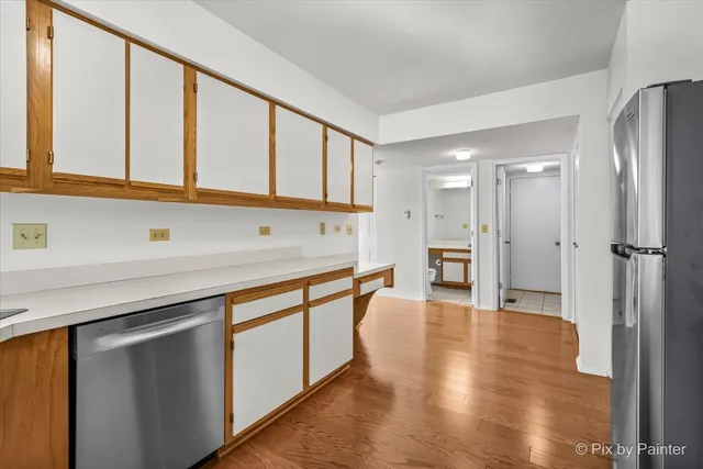 a view of a refrigerator and window