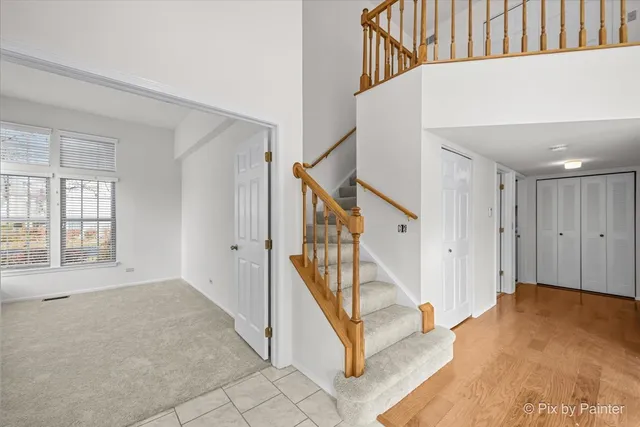 a view of a hallway with staircase