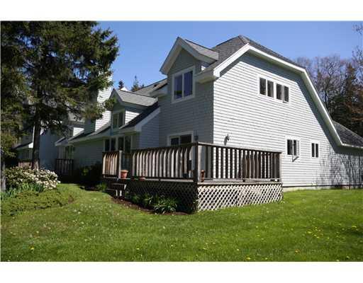 15 West Harbor Pond Road, Unit 15D West Boothbay Harbor, ME 04575 - Photo 2 of 10 Exterior Front. Deck facing the pond...