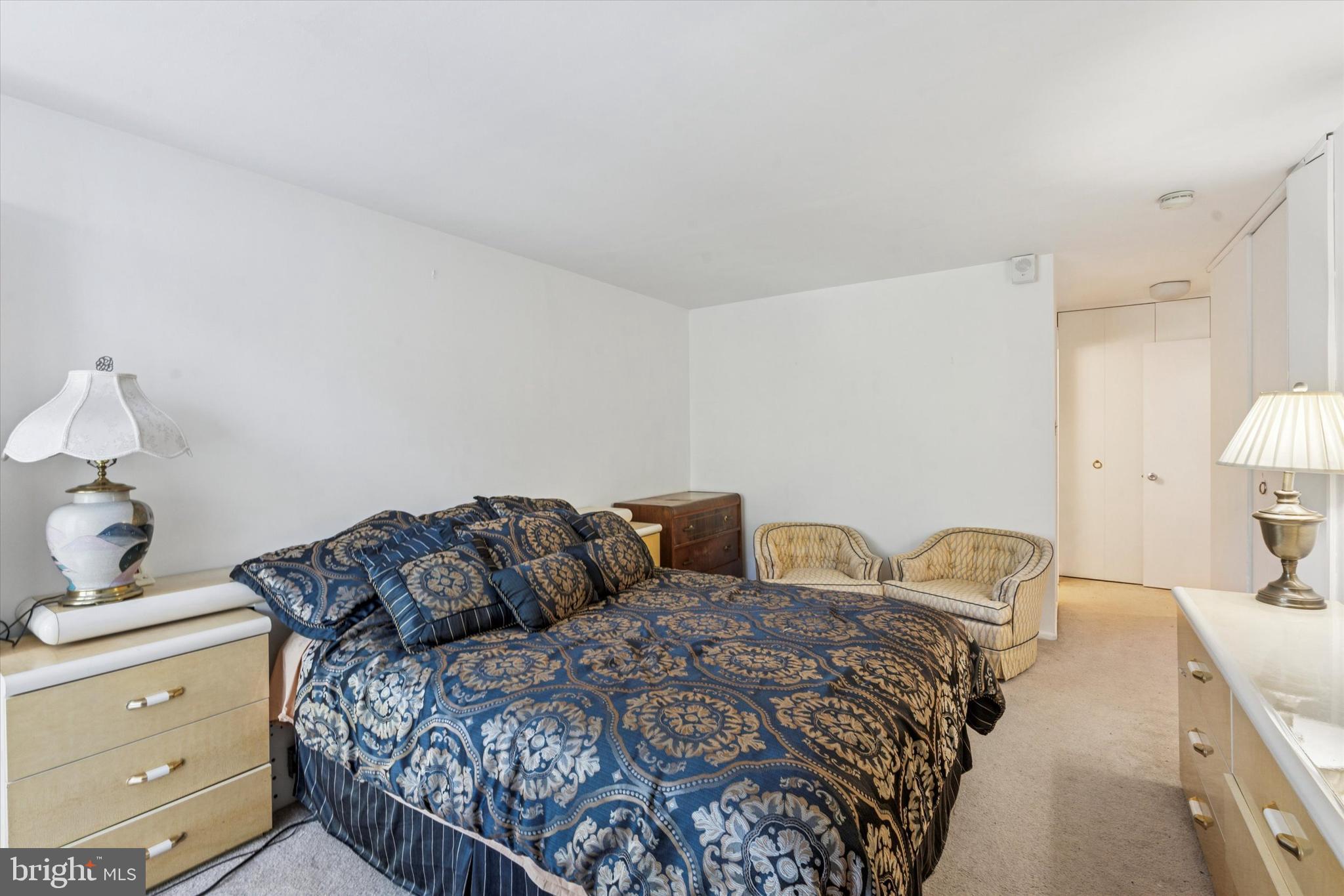 3600 Conshohocken Avenue, Unit 116 Philadelphia, PA 19131 - Photo 21 of 25 a bedroom with a bed and window