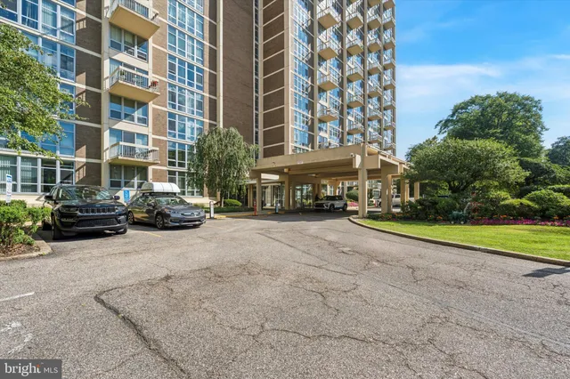 a building with trees in front of it