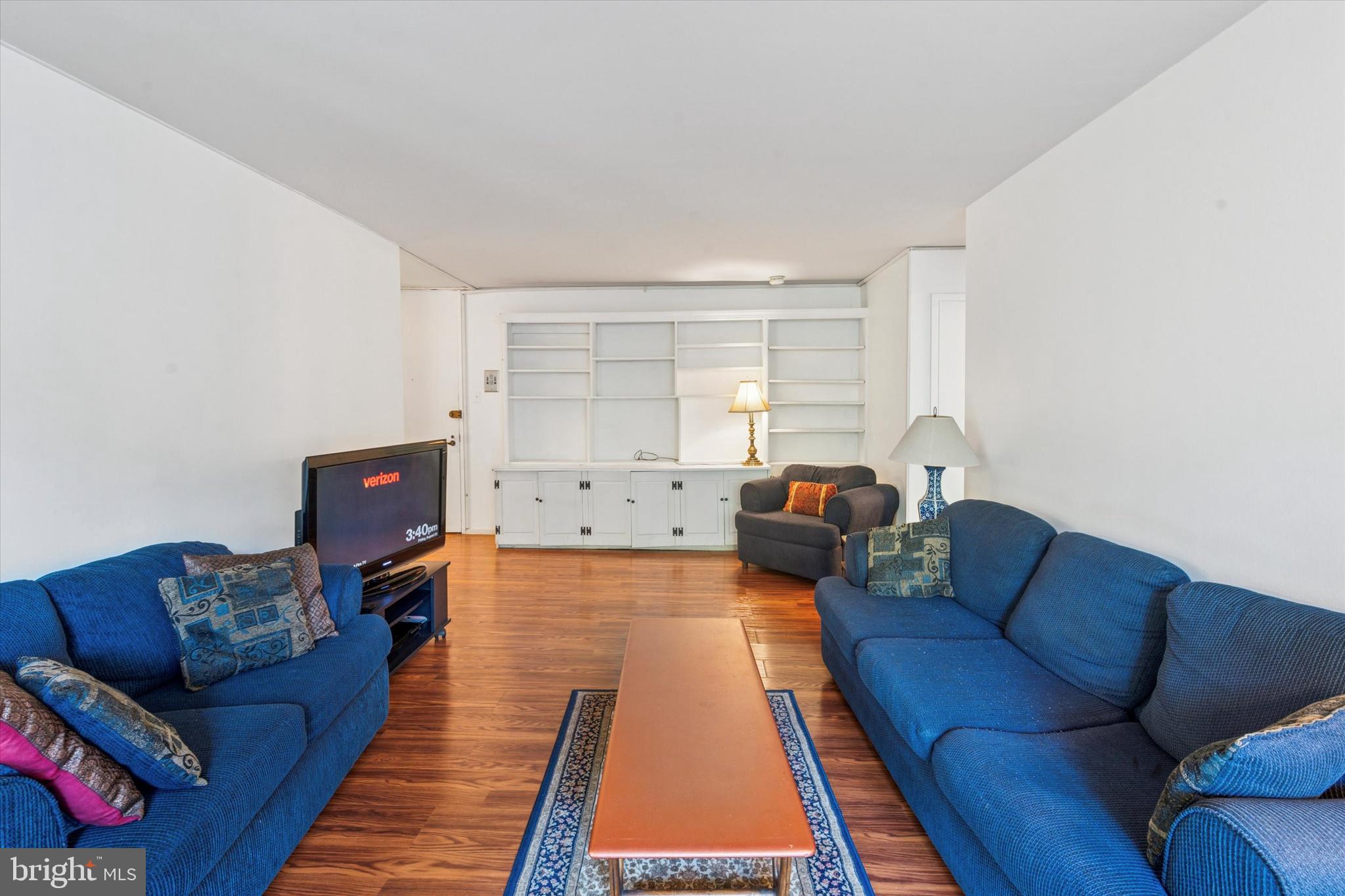 3600 Conshohocken Avenue, Unit 116 Philadelphia, PA 19131 - Photo 3 of 25 a living room with furniture and a couch
