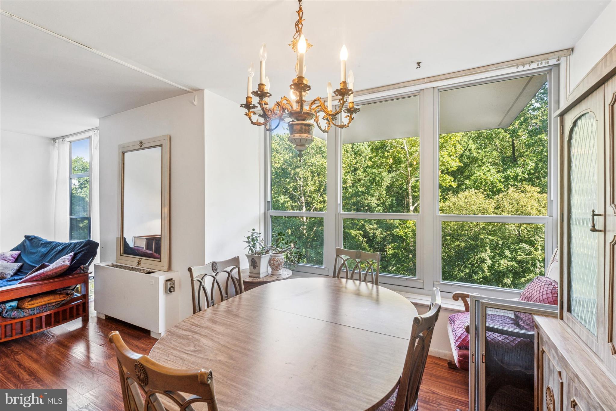 3600 Conshohocken Avenue, Unit 116 Philadelphia, PA 19131 - Photo 9 of 25 a view of a dining room with furniture window and outside view