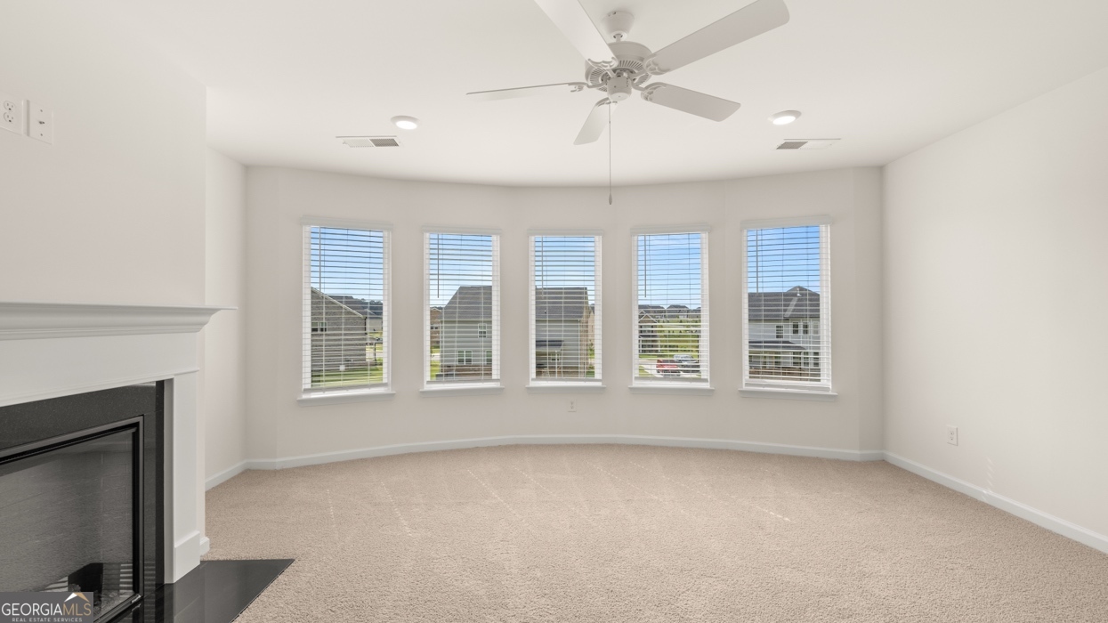 416 Hazel Drive Locust Grove, GA 30248 - Photo 16 of 31 a view of an empty room with a window