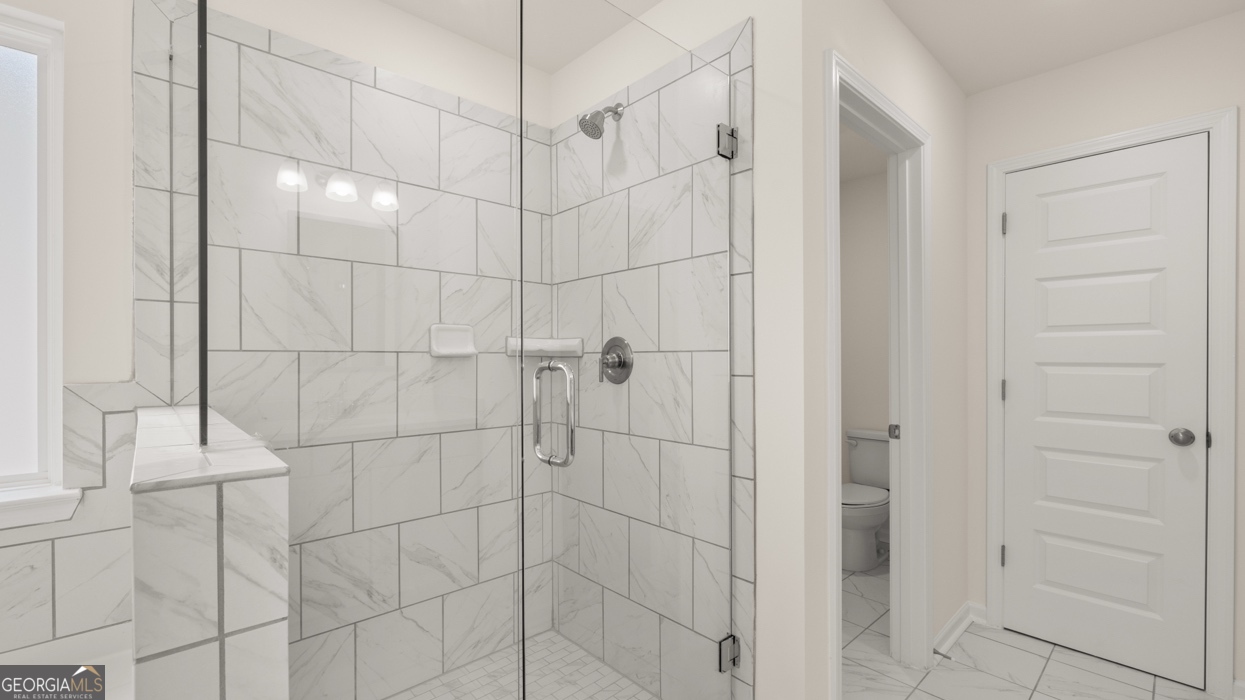 416 Hazel Drive Locust Grove, GA 30248 - Photo 20 of 31 a bathroom with a shower