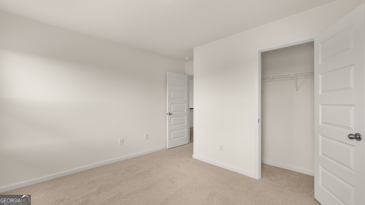 416 Hazel Drive Locust Grove, GA 30248 - Photo 22 of 31 a view of an empty room