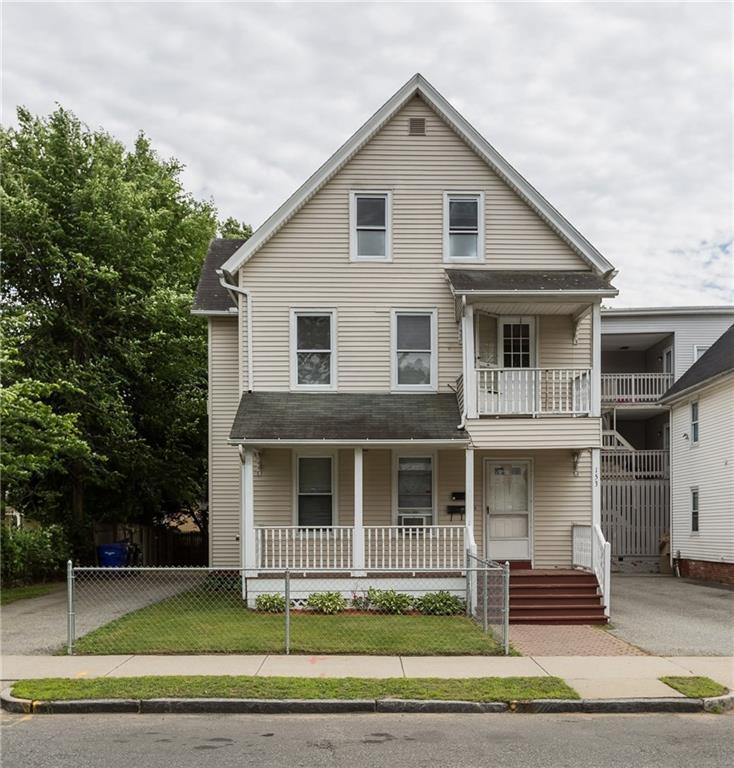 153 King Street Springfield, MA 01109 - Photo 1 of 1 a front view of a house with a garden