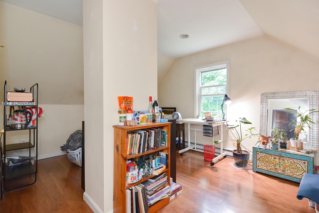 52 Tower Street Boston, MA 02130 - Photo 22 of 29 a living room with lots of furniture and a wooden floor