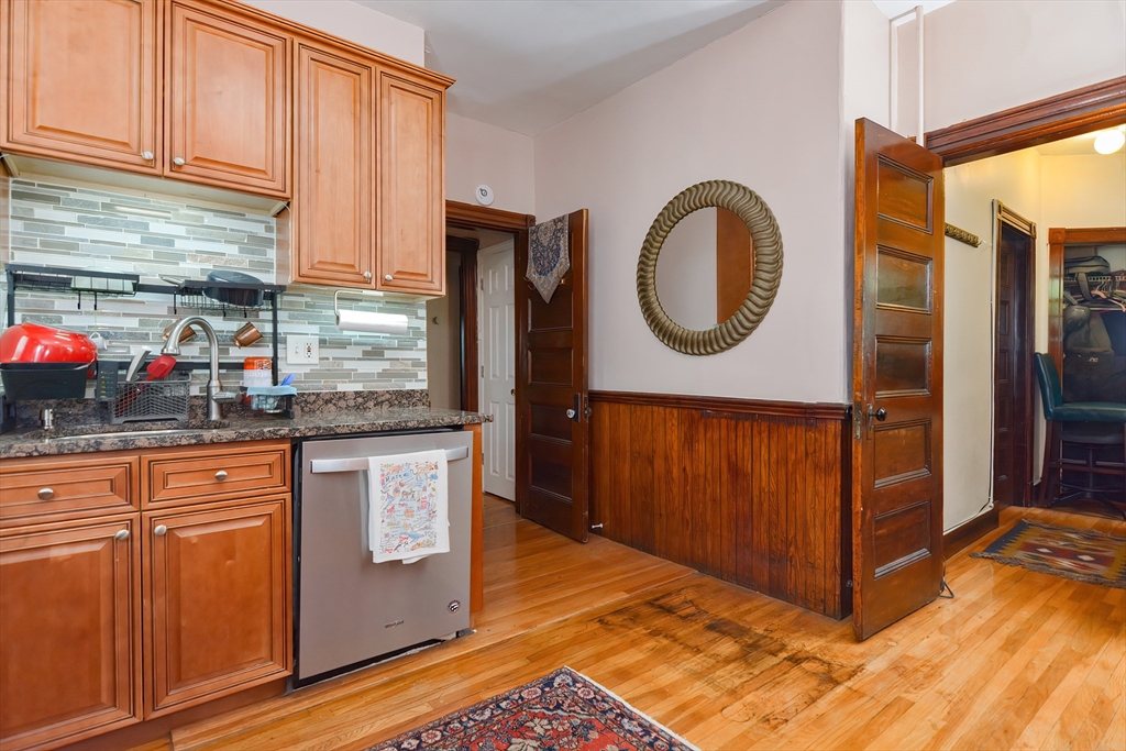52 Tower Street Boston, MA 02130 - Photo 9 of 29 a view of a kitchen with wooden floor and a sink