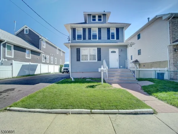 front view of house with a yard