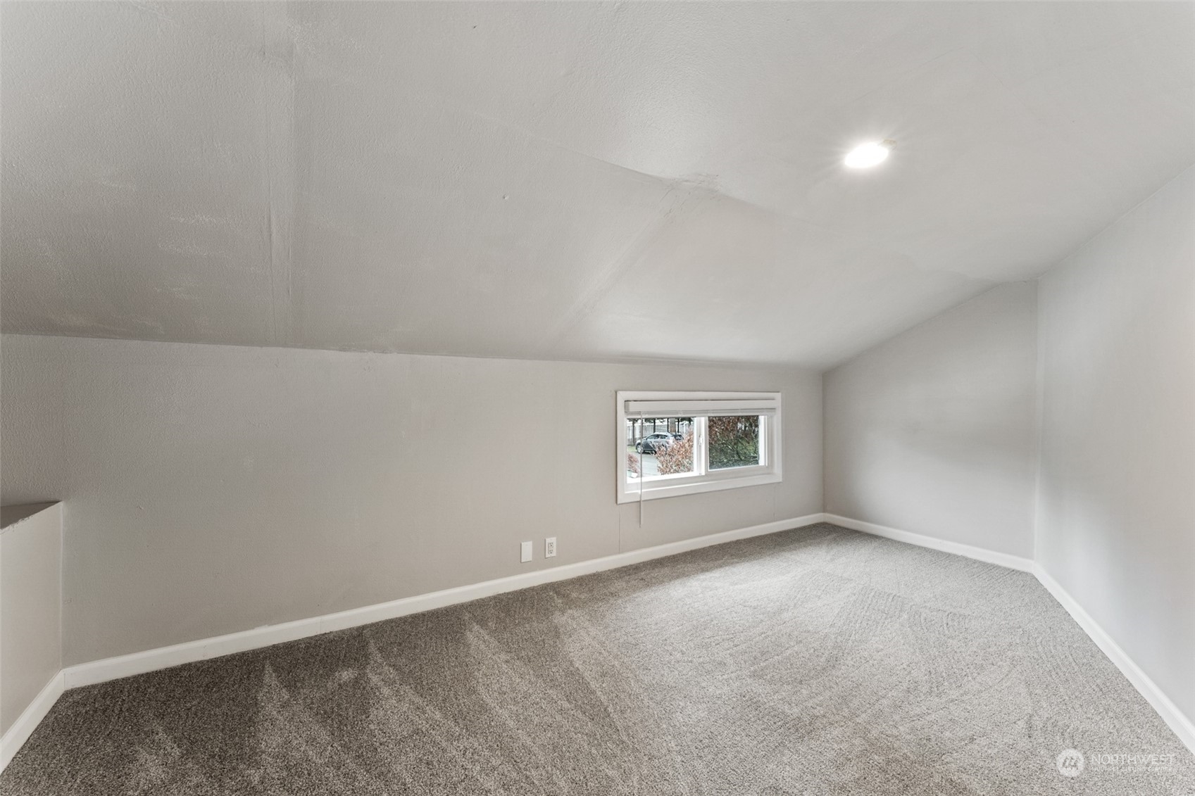 8520 Meadow Road Southwest Lakewood, WA 98499 - Photo 22 of 24 an empty room with a window
