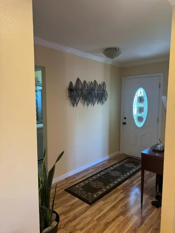 a view of a livingroom with furniture and window