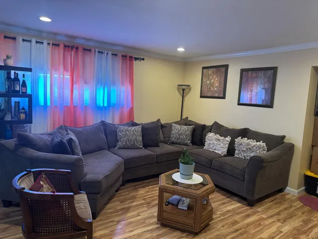 a living room with furniture and a couch