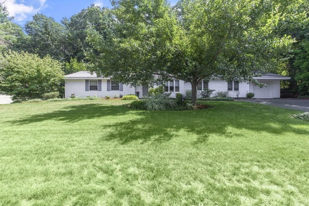 30 Larnis Road Framingham, MA 01701 - Photo 1 of 42 a front view of a house with a garden