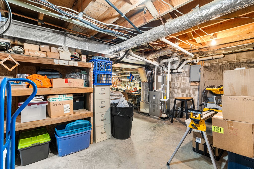 1721 Settlement Road Young Harris, GA 30582 - Photo 28 of 54 a view of a storage room with a lot of stuff