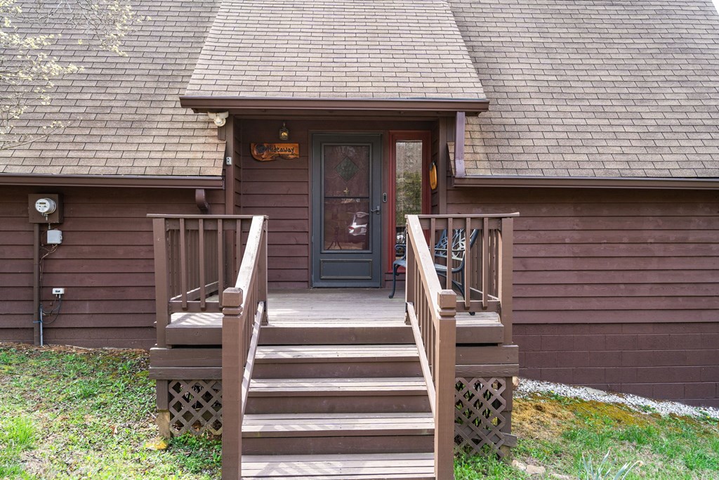 1721 Settlement Road Young Harris, GA 30582 - Photo 45 of 54 a front view of a house with wooden stairs