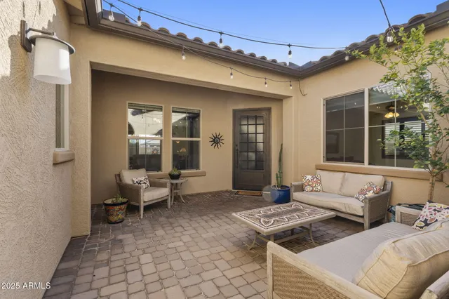 a view of a lot of a house with a yard and parking space
