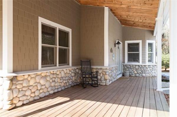 69 Kingland Road Stow, MA 01775 - Photo 3 of 30 front view of a house with wooden floor