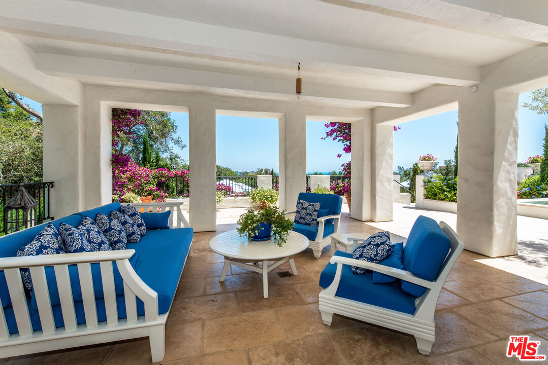 848 Picacho Lane Montecito, CA 93108 - Photo 11 of 22 a living room with furniture and a potted plant
