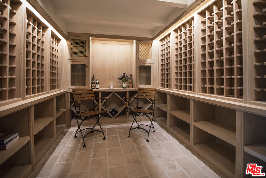 848 Picacho Lane Montecito, CA 93108 - Photo 17 of 22 a view of a workspace with furniture and a window