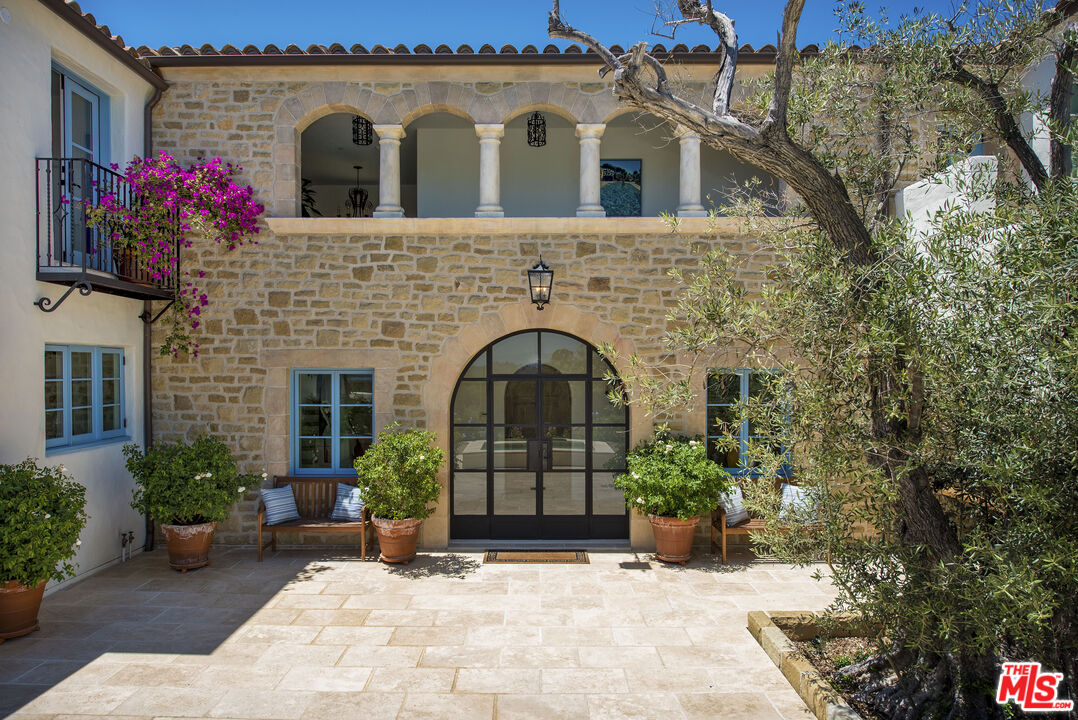 848 Picacho Lane Montecito, CA 93108 - Photo 5 of 22 a front view of a house with garden