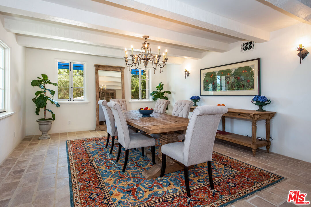 848 Picacho Lane Montecito, CA 93108 - Photo 10 of 22 a view of a dining room with furniture window and wooden floor