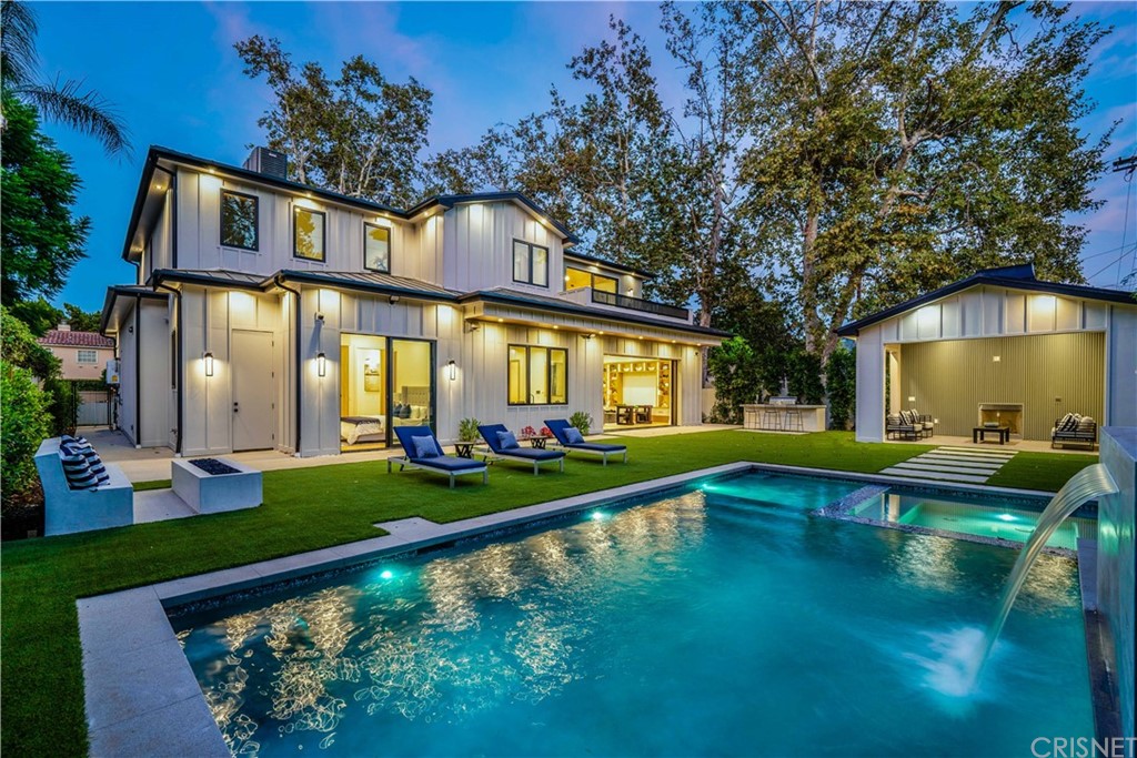 11201 Valley Spring Lane Studio City, CA 91602 - Photo 14 of 14 a view of a house with swimming pool patio and garden