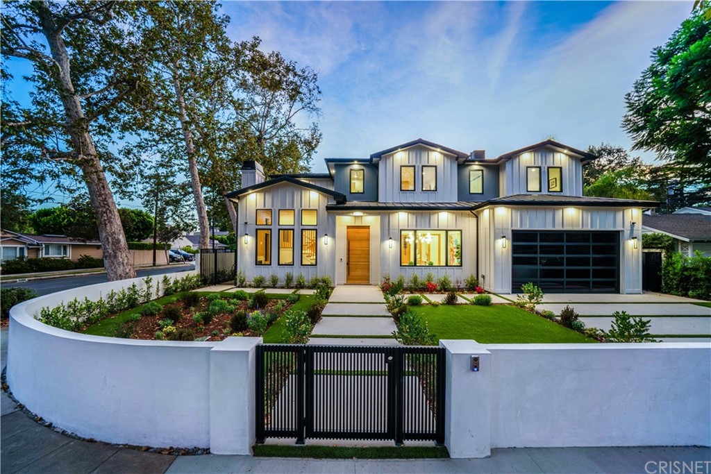 11201 Valley Spring Lane Studio City, CA 91602 - Photo 2 of 14 a front view of a house with a yard