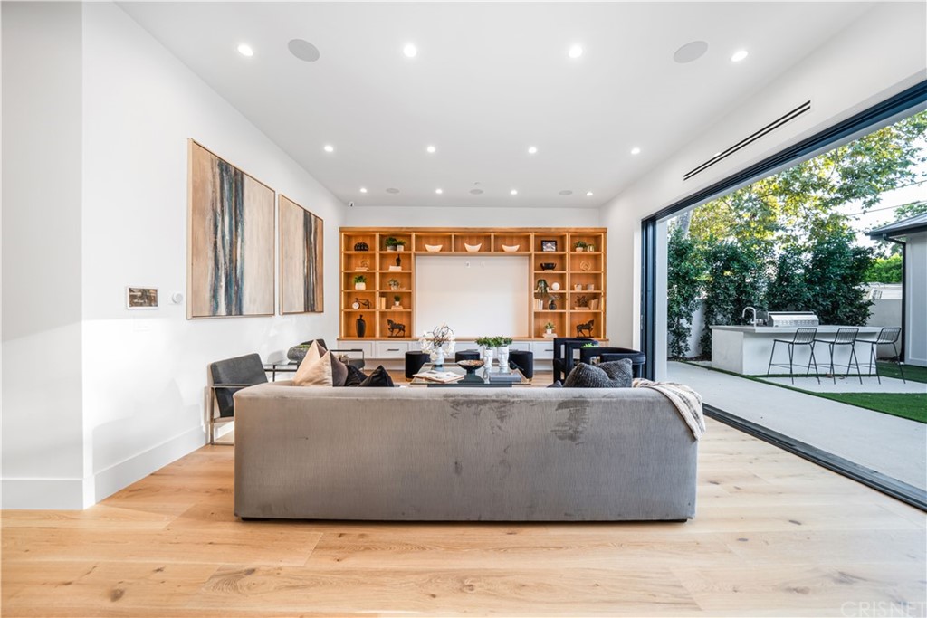 11201 Valley Spring Lane Studio City, CA 91602 - Photo 6 of 14 a living room with couch and a large window