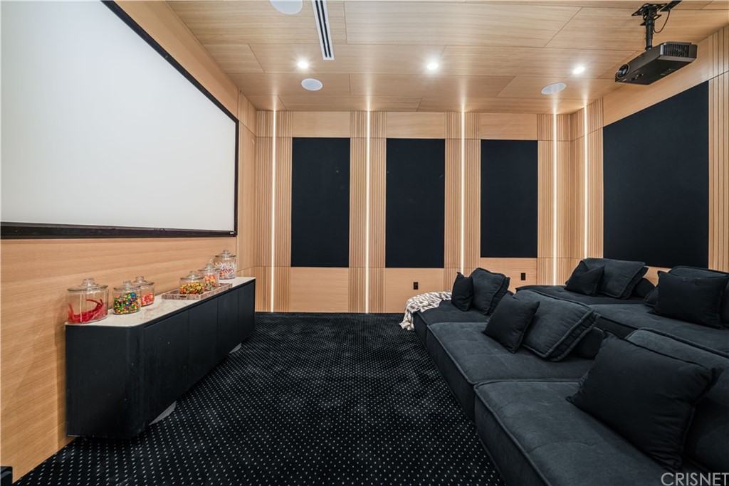 11201 Valley Spring Lane Studio City, CA 91602 - Photo 9 of 14 a living room with furniture and a flat screen tv