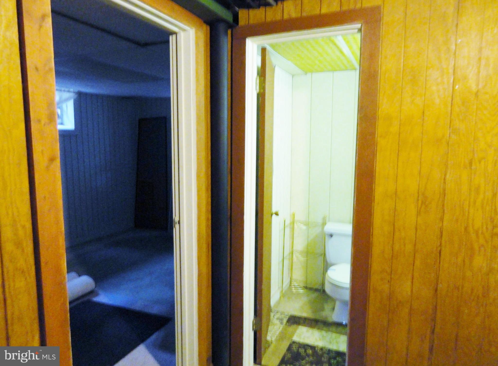11701 Cemetery Road Bealeton, VA 22712 - Photo 16 of 30 Basement view to 1/2 bath and room