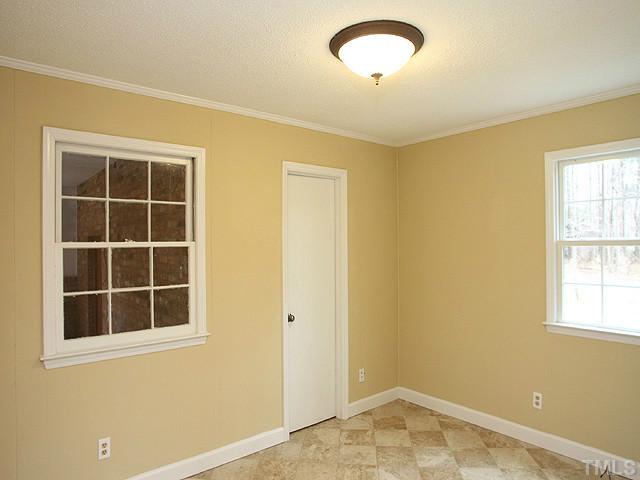 2512 Win Road Garner, NC 27529 - Photo 11 of 18 Downstairs bedroom or office. Large cedar closet.