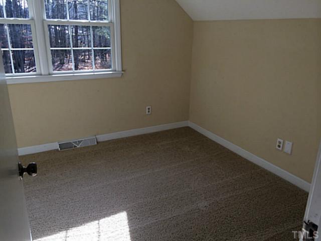 2512 Win Road Garner, NC 27529 - Photo 18 of 18 Upstairs bedroom with lovely view of woods.