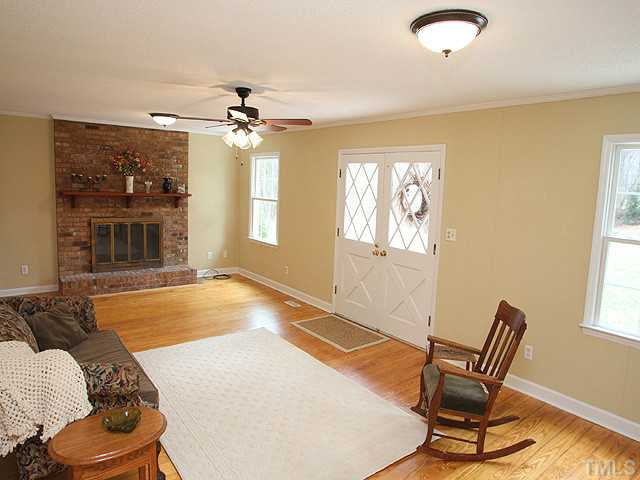 2512 Win Road Garner, NC 27529 - Photo 2 of 18 Living room with masonry fireplace