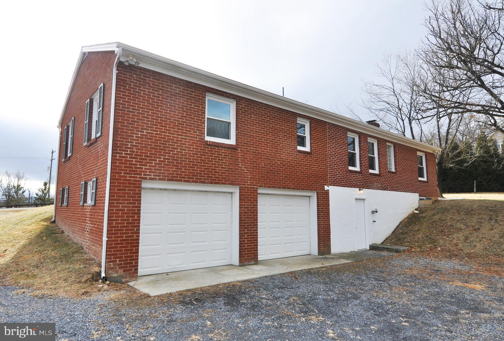 260 Redland Road Cross Junction, VA 22625 - Photo 7 of 30 Rear of house showing garage bays