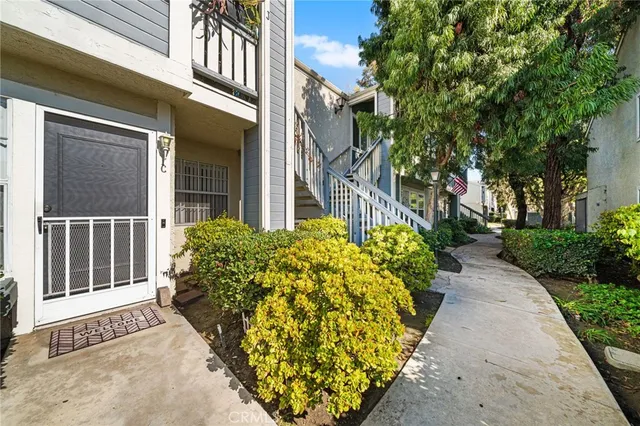 a view of a pathway with a house