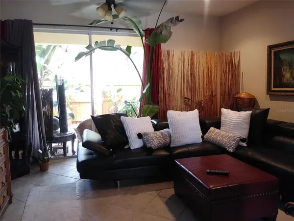 a kitchen with a stove and white cabinets