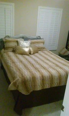 a view of a backyard of the house