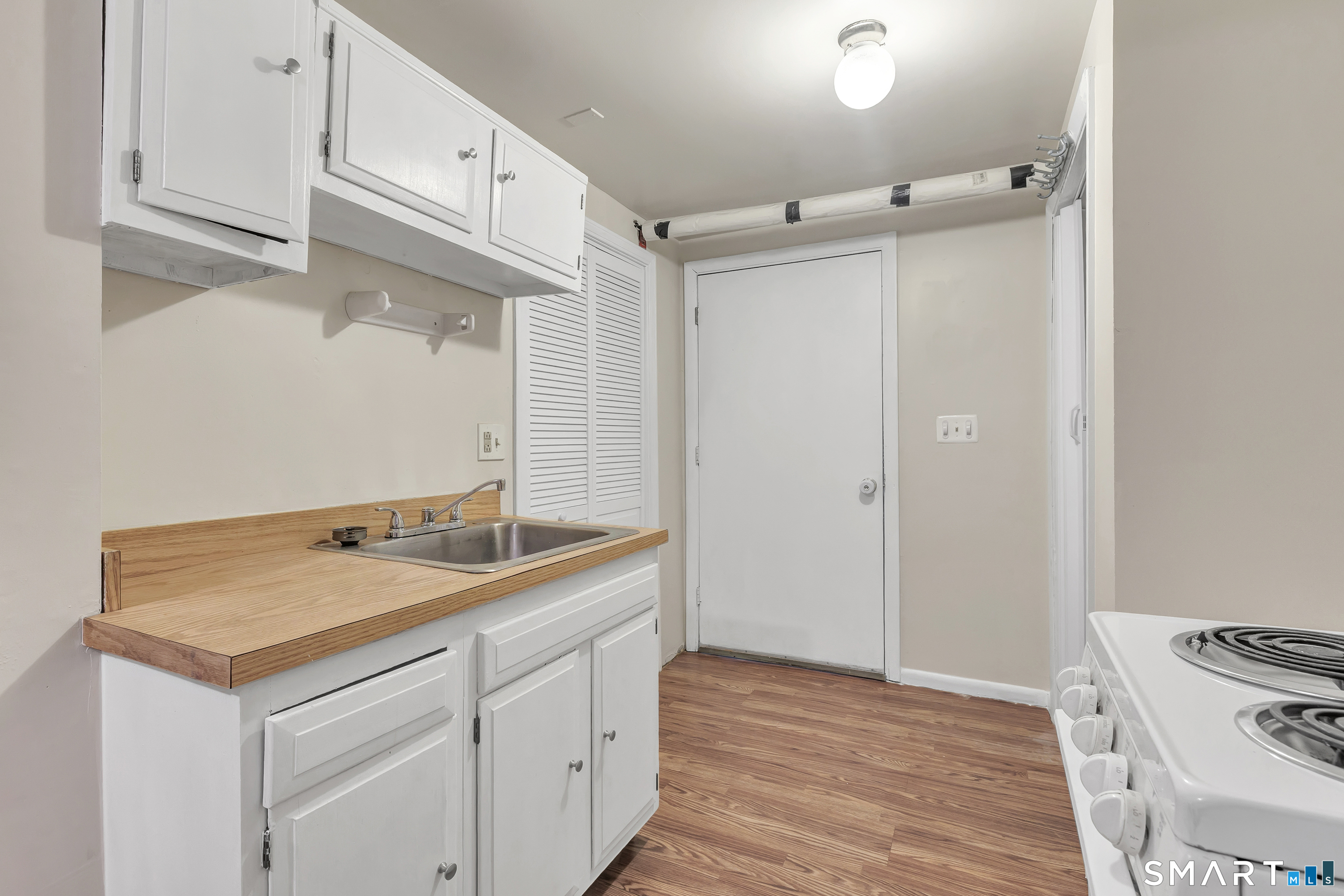 123 River Road Shelton, CT 06484 - Photo 22 of 27 a bathroom with a granite countertop sink and a mirror