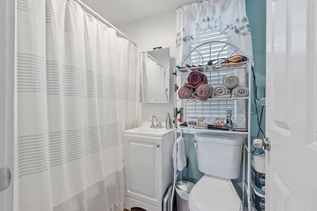 a view of a storage room with racks