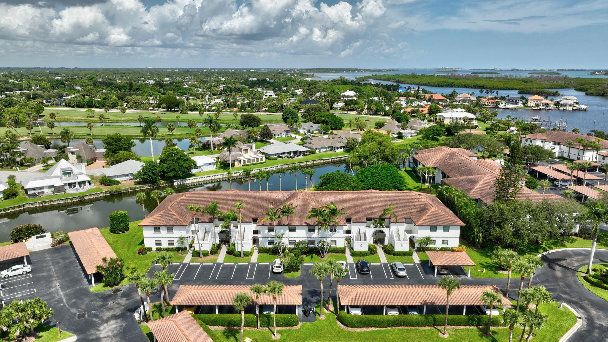 6101 Southeast Landing Way, Unit 11 Stuart, FL 34997 - Photo 29 of 55 an aerial view of multiple house