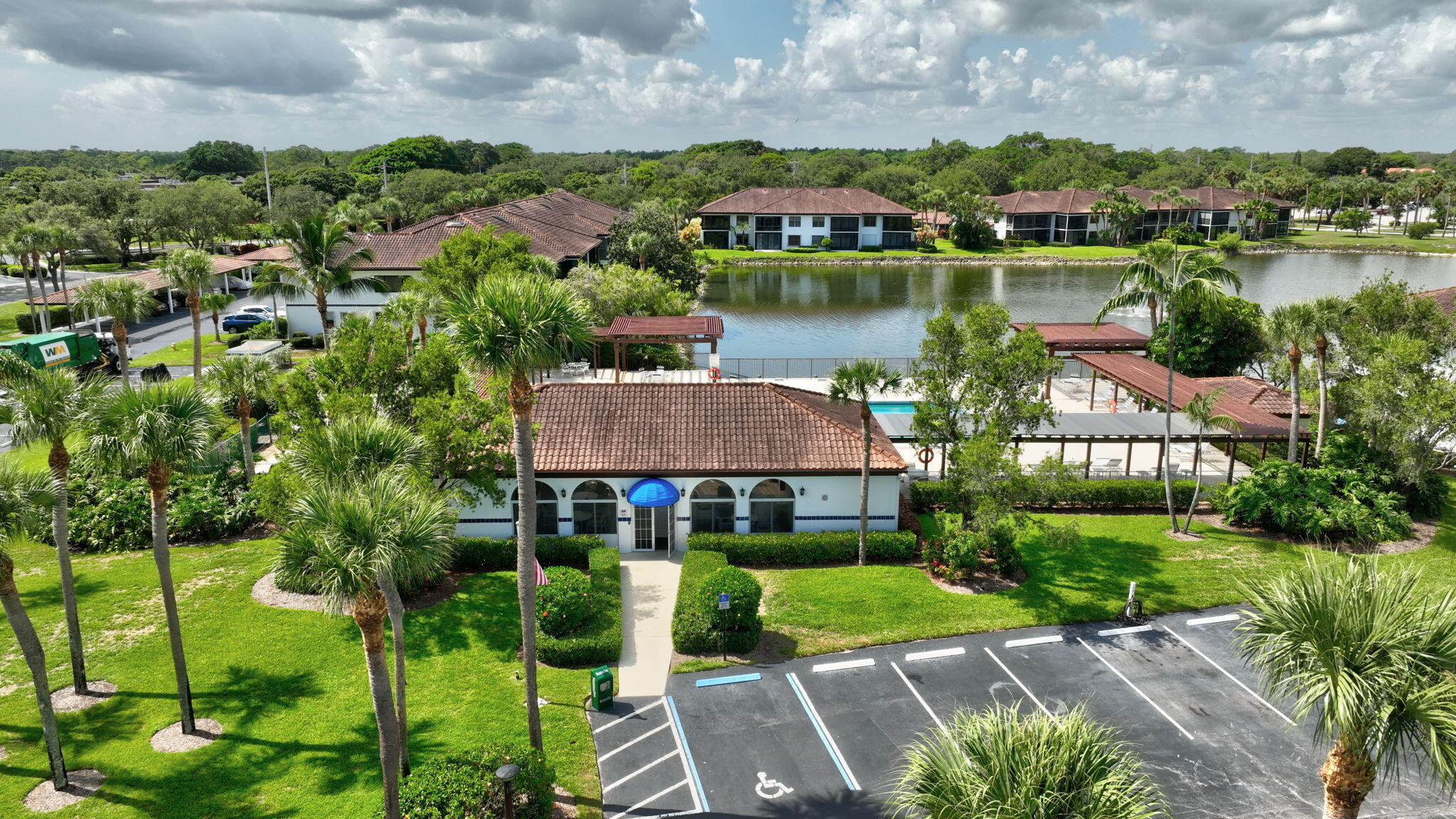 6101 Southeast Landing Way, Unit 11 Stuart, FL 34997 - Photo 39 of 55 a view of a house with a yard and lake view